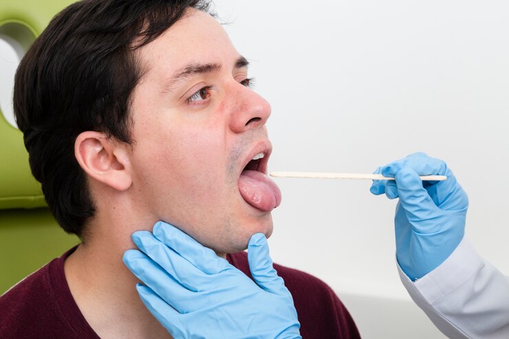 close-up-examination-with-tongue-depressor_23-2148231303