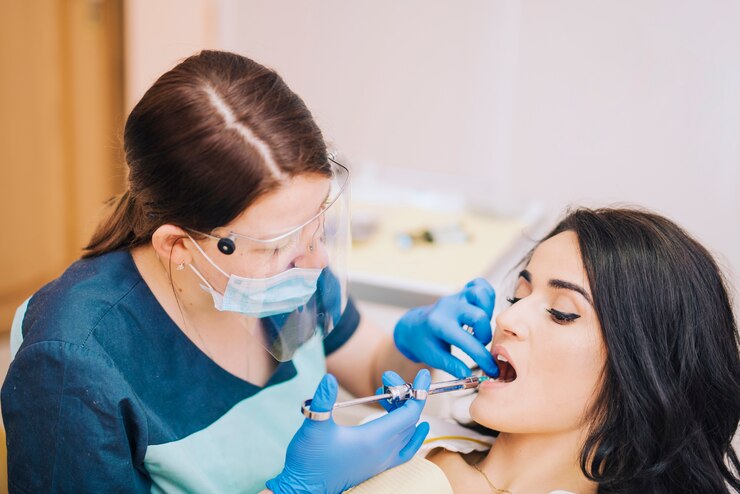 dentist-making-anesthetic-injection-patient_23-2148085337