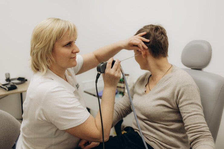 elderly-woman-receives-tympanometry-with-tympanometer-probe-hearing-clinic-hearing-checkup-impedance-audiometry_633611-11321