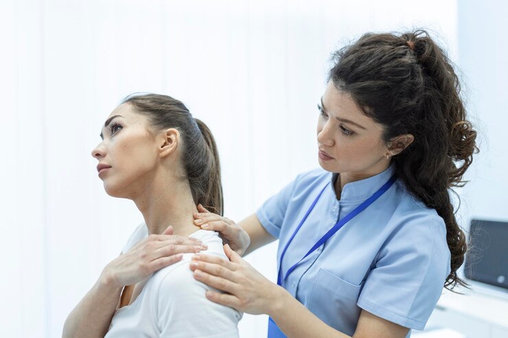 woman-doctor-osteopath-medical-uniform-fixing-woman-patients-shoulder-back-joints-manual-therapy-clinic-visit-professional-osteopath-work-with-patient-concept_1212-7127