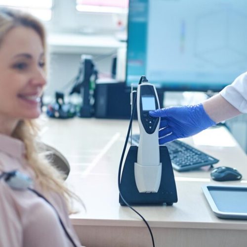 blonde-longhaired-woman-having-hearing-check-hospital_259150-60611