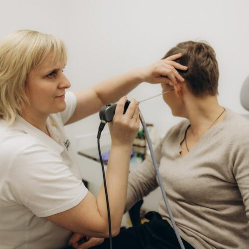 elderly-woman-receives-tympanometry-with-tympanometer-probe-hearing-clinic-hearing-checkup-impedance-audiometry_633611-11321