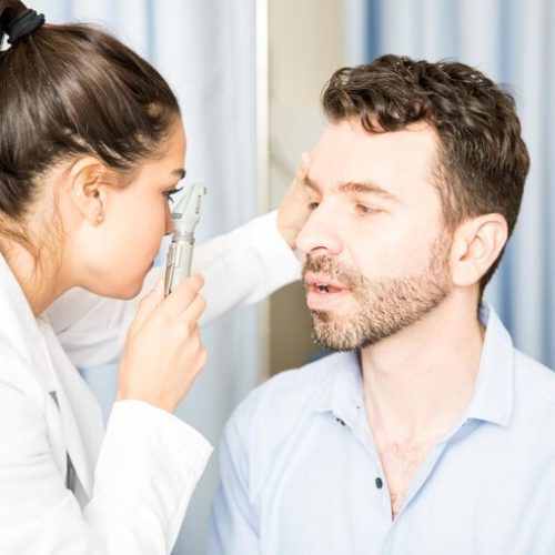 female-eye-doctor-using-otoscope-examine-patient-s-eyes-her-clinic_662251-522