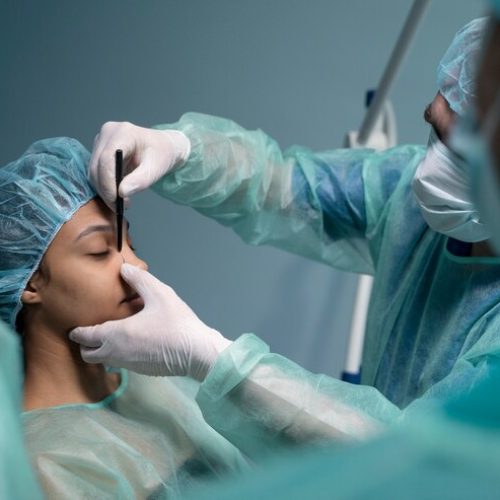 side-view-doctor-checking-patient-before-rhinoplasty_23-2149352178